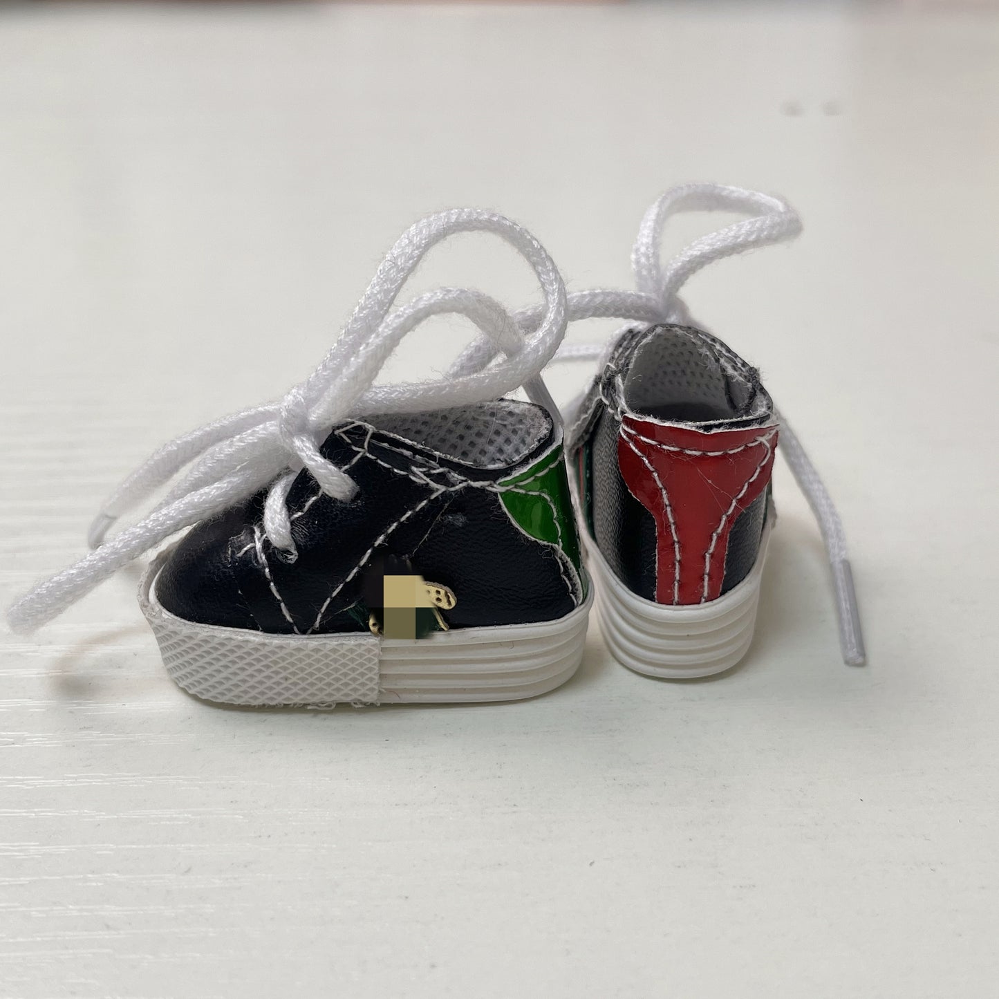 The shoes of the LAbubu doll — Designer style