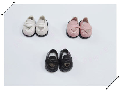 The loafers  shoes of the LAbubu doll —  Designer style